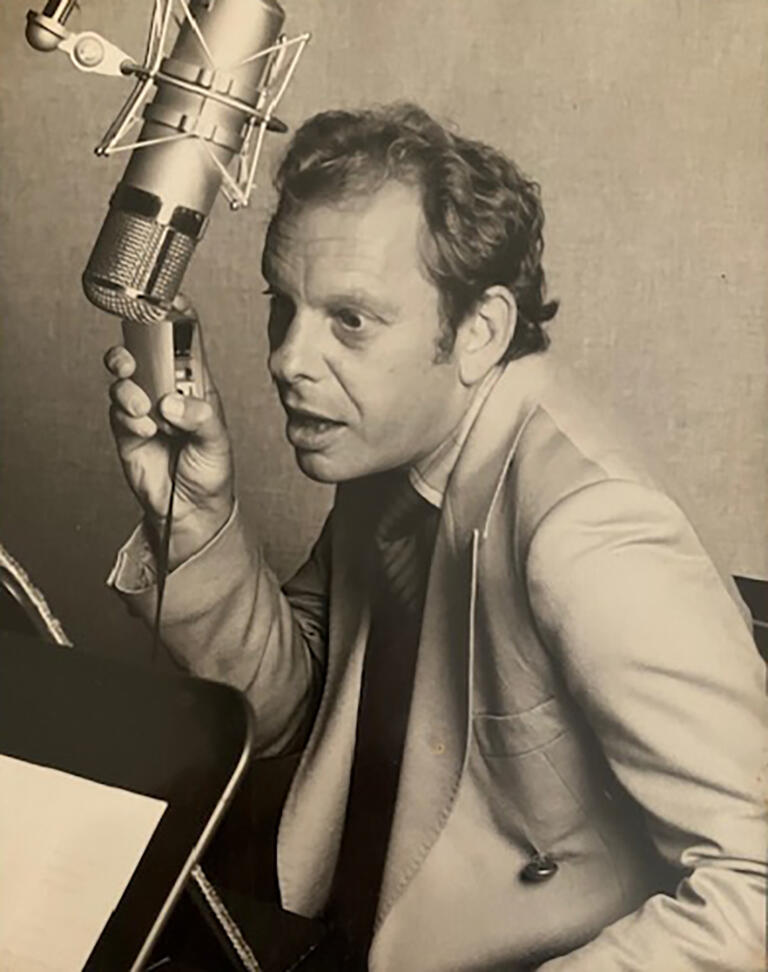 Larry Belling as an adult in a recording studio