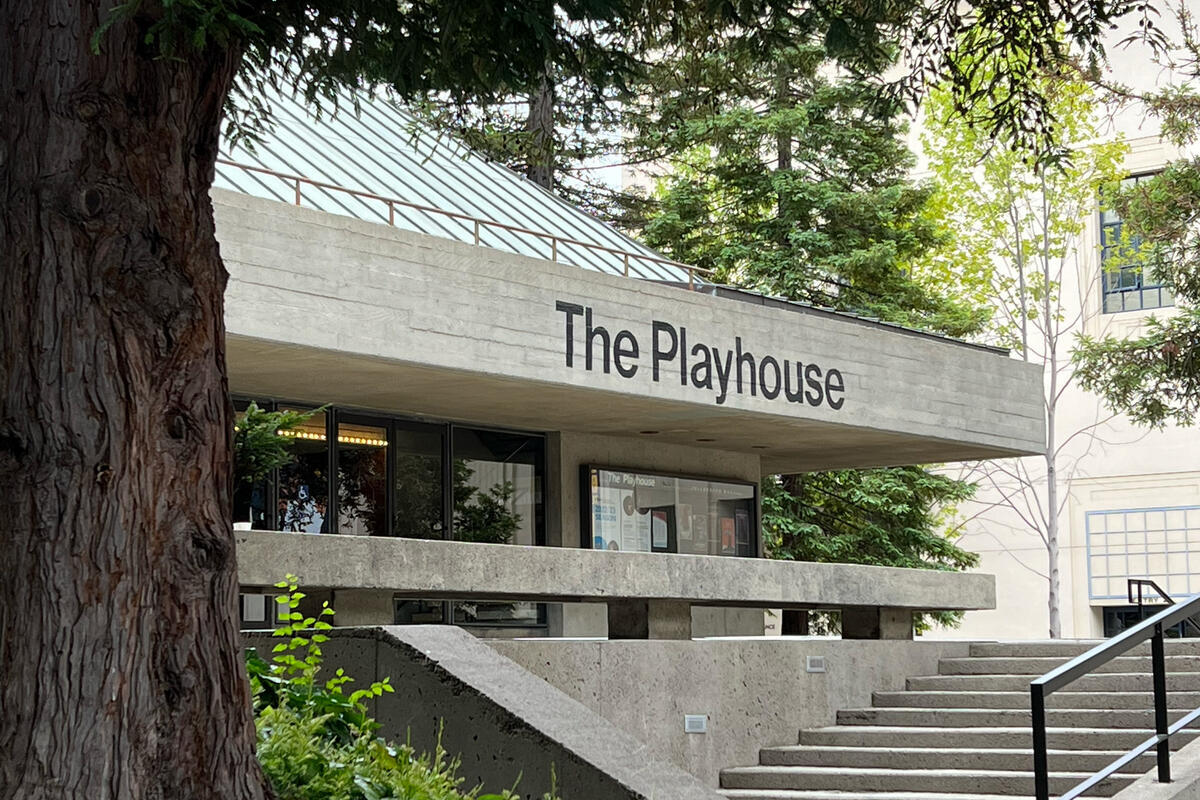 Exterior of Zellerbach Playhouse, a Brutalist-style building surround by redwood trees
